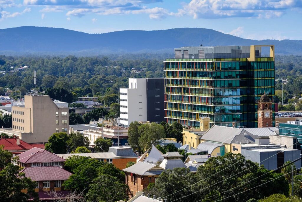 Ipswich city skyline featuring commercial buildings – Trusted financial advisors at Direct Wealth provide expert financial advice in Ipswich.